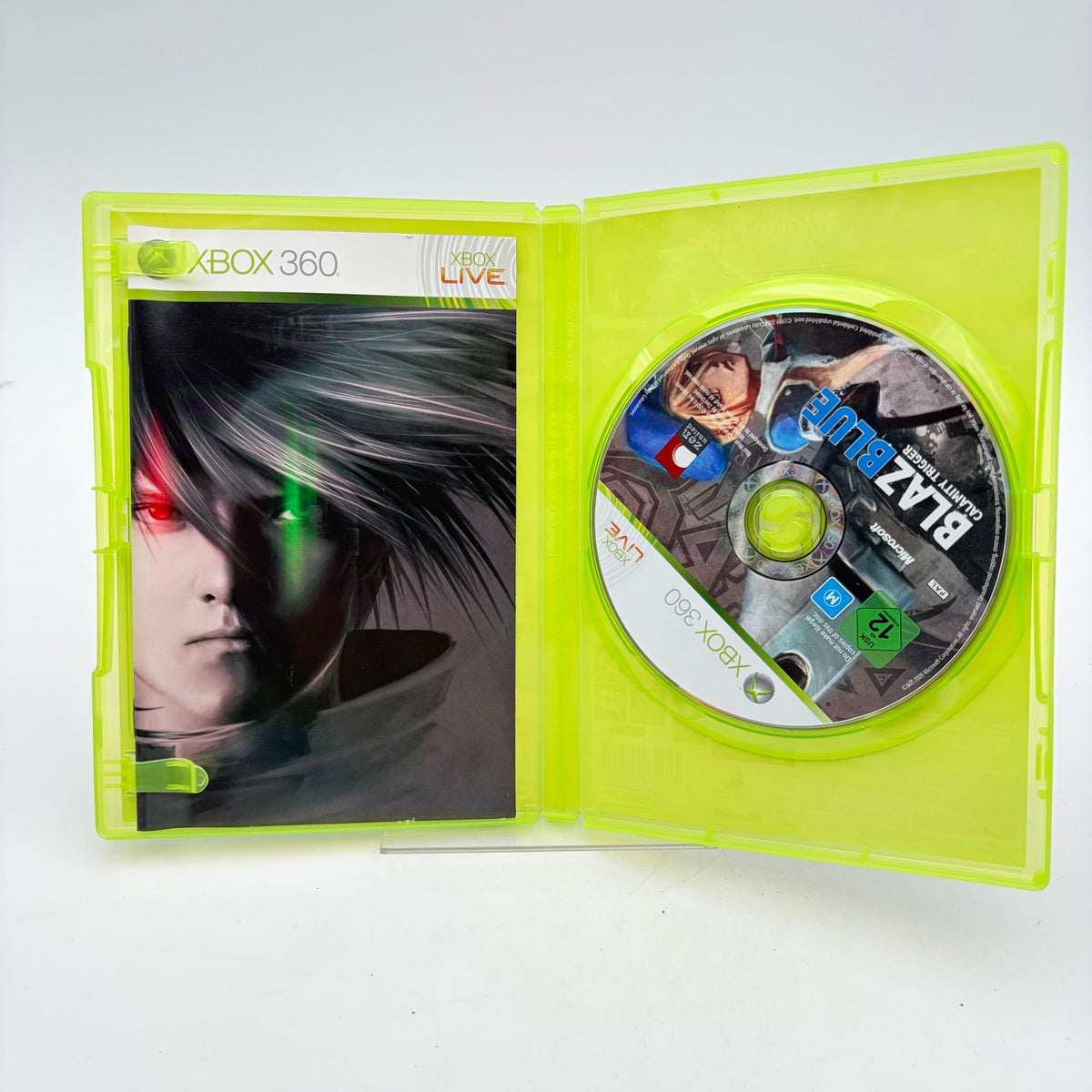 BLAZBLUE CALAMITY TRIGGER - XBOX 360 - Strike Games
