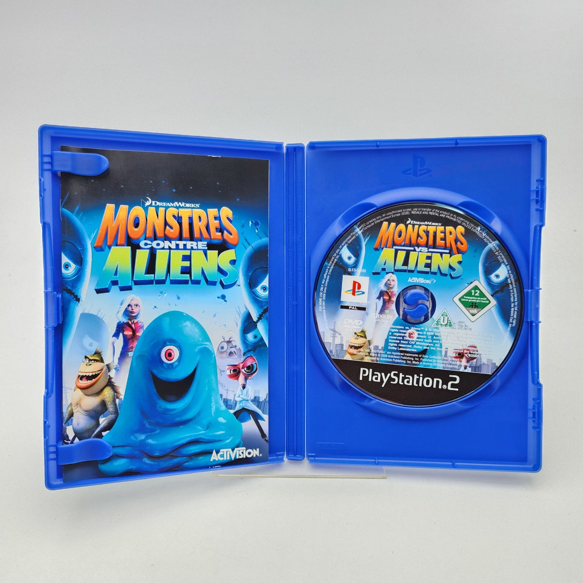 MONSTRES CONTRE ALIENS - PLAYSTATION 2 - Strike Games